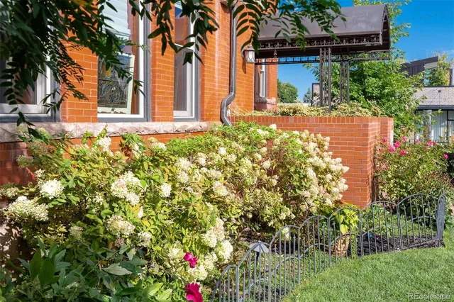 a view of a chairs and table in the patio