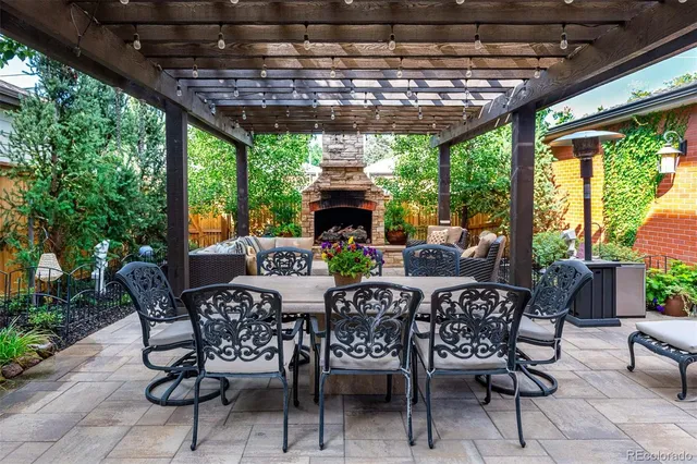 a view of a patio filled with furniture