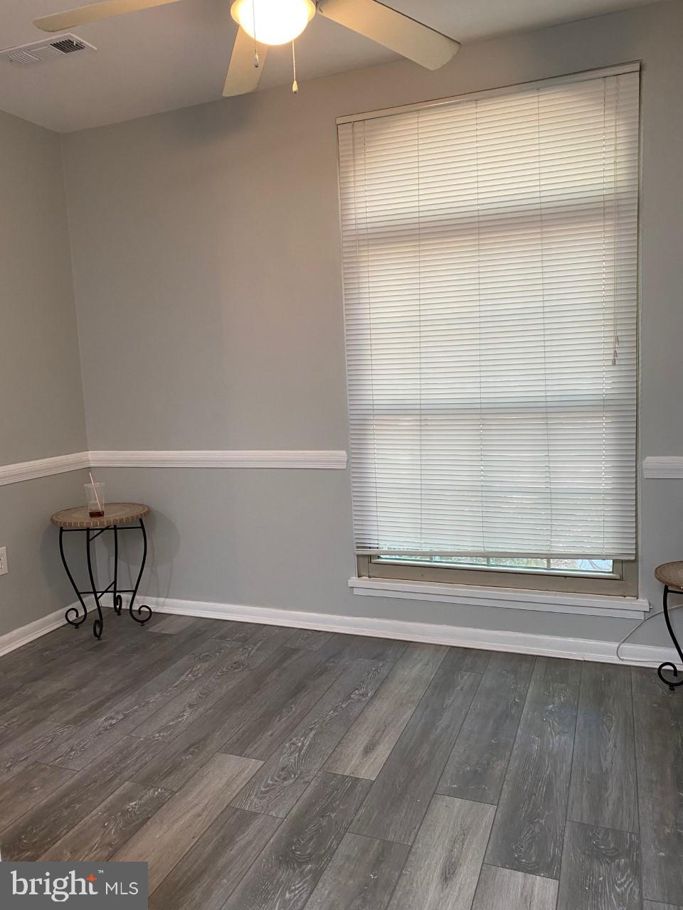 8316 Tobin Road, Unit 13 Annandale, VA 22003 - Photo 9 of 11 a view of a room with wooden floor and a sink