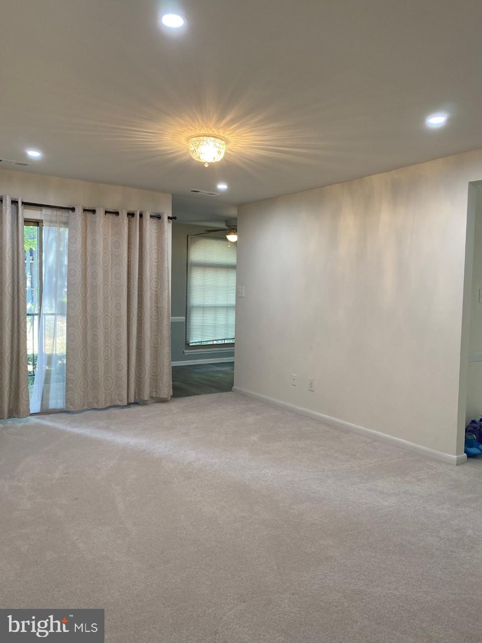 8316 Tobin Road, Unit 13 Annandale, VA 22003 - Photo 10 of 11 an empty room with windows and closet