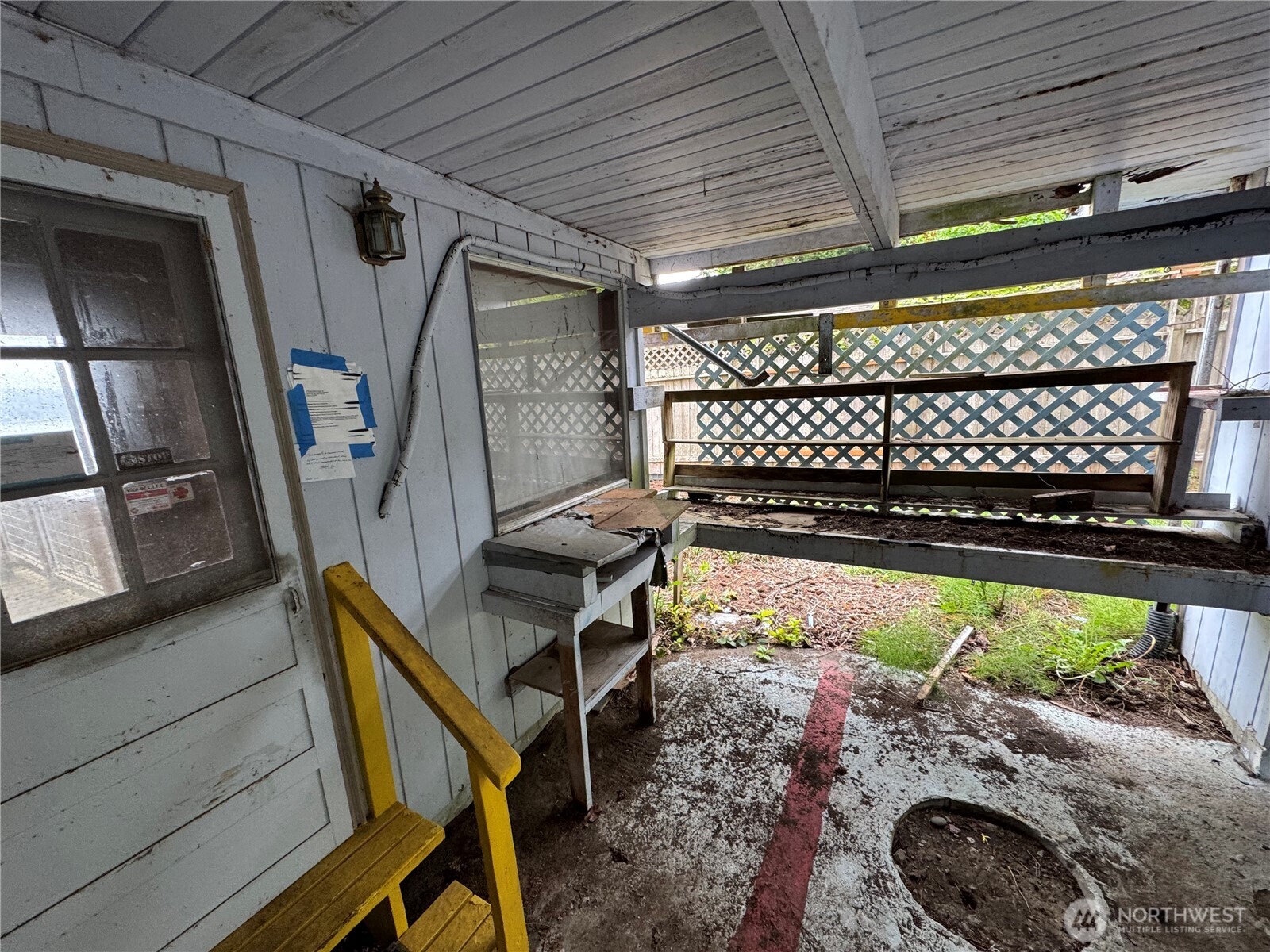 1284 Dines Point Road Greenbank, WA 98253 - Photo 19 of 39 a view of a porch with furniture