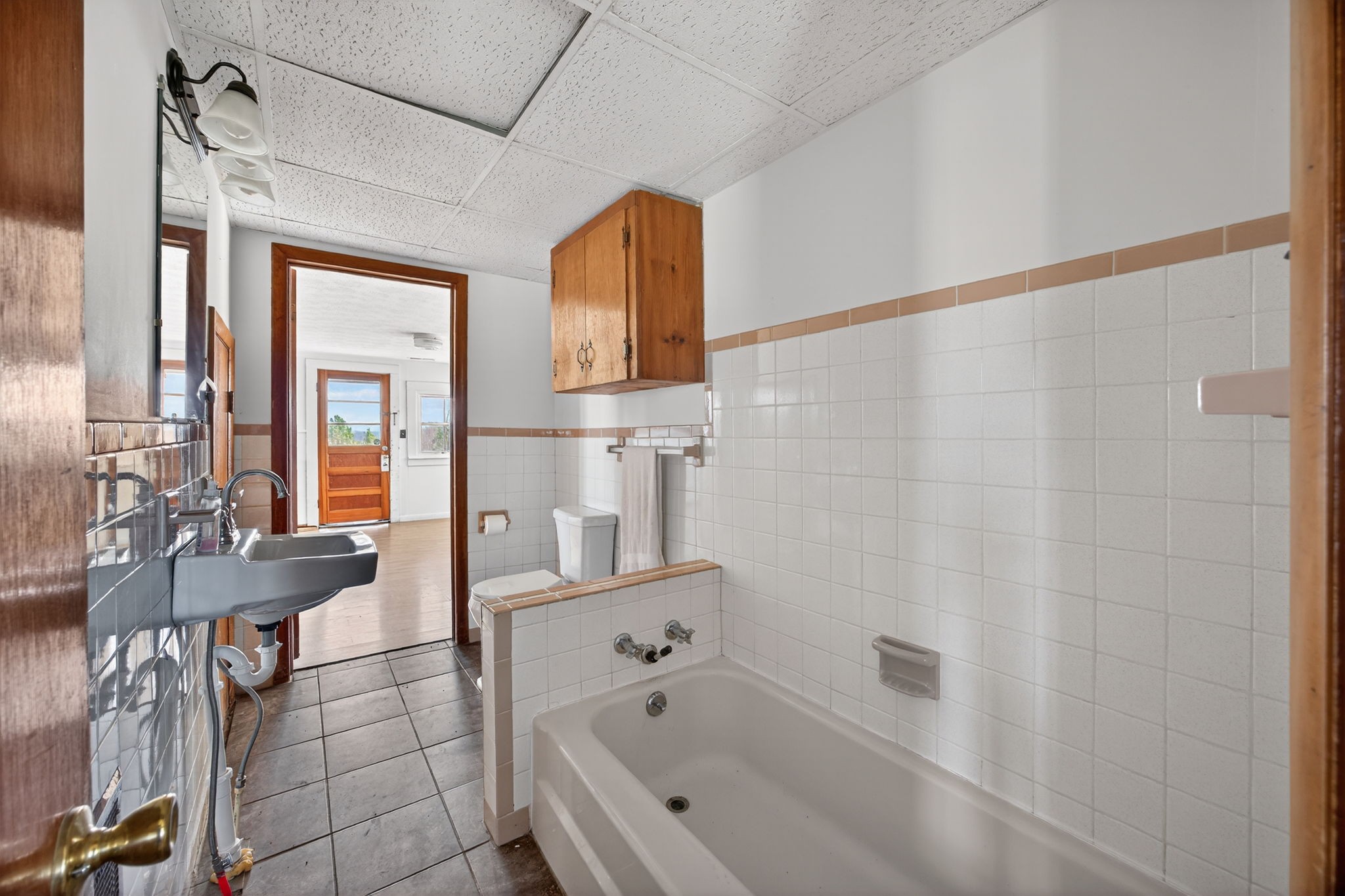 1298 South Bunker Hill Road Sparta, TN 38583 - Photo 12 of 35 a bathroom with a bathtub a sink and a shower