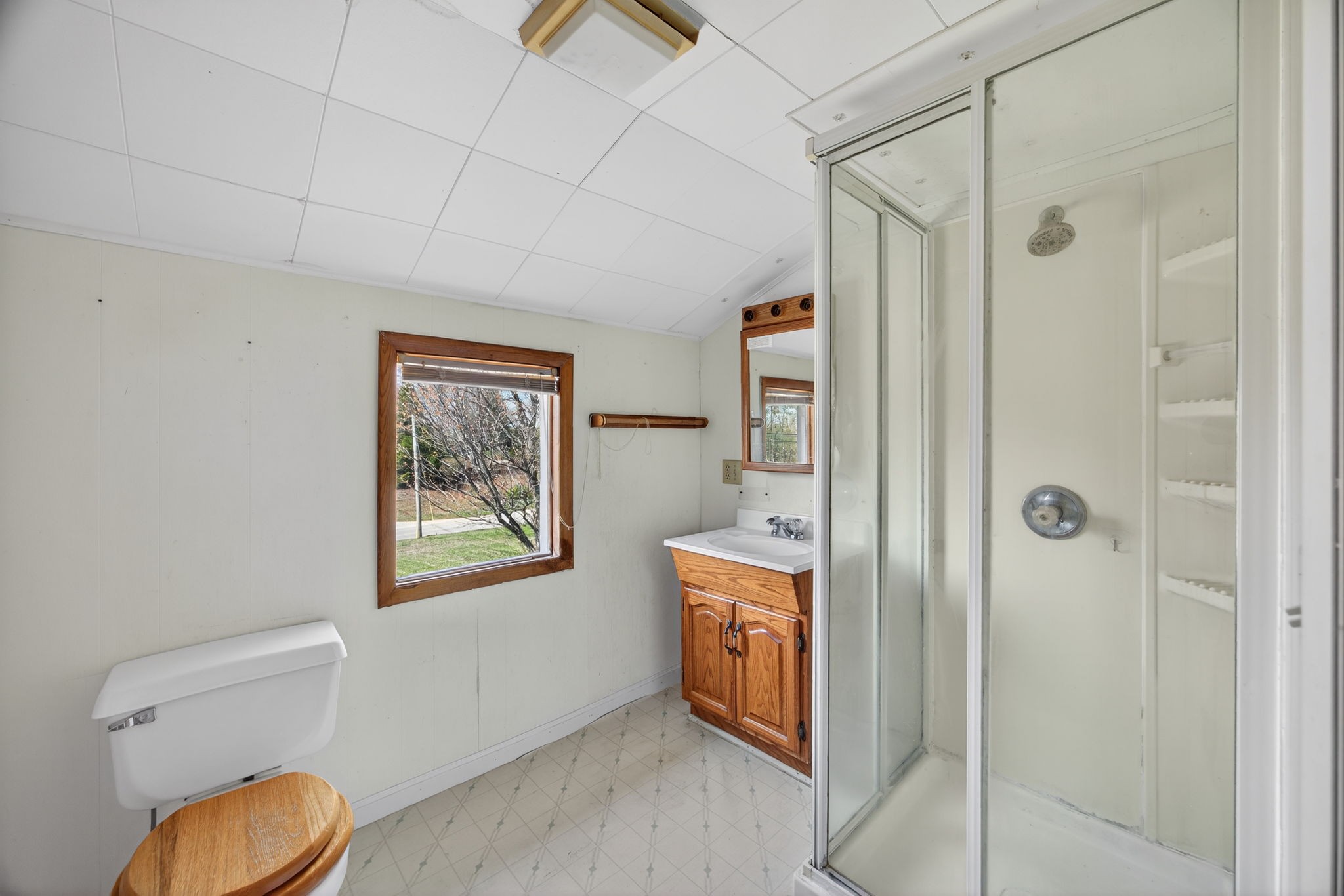 1298 South Bunker Hill Road Sparta, TN 38583 - Photo 17 of 35 a bathroom with a toilet sink and shower
