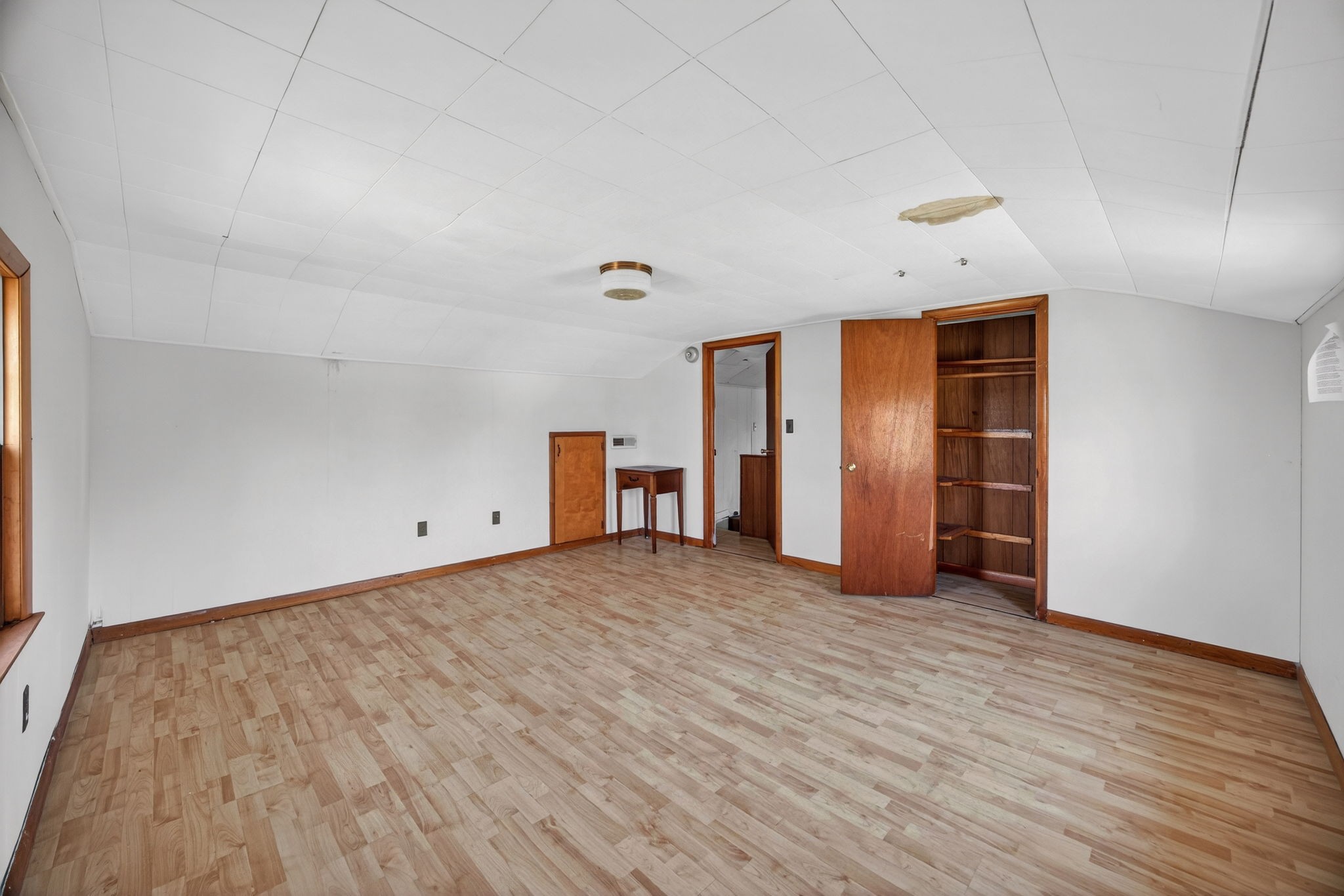 1298 South Bunker Hill Road Sparta, TN 38583 - Photo 18 of 35 a view of an empty room with wooden floor