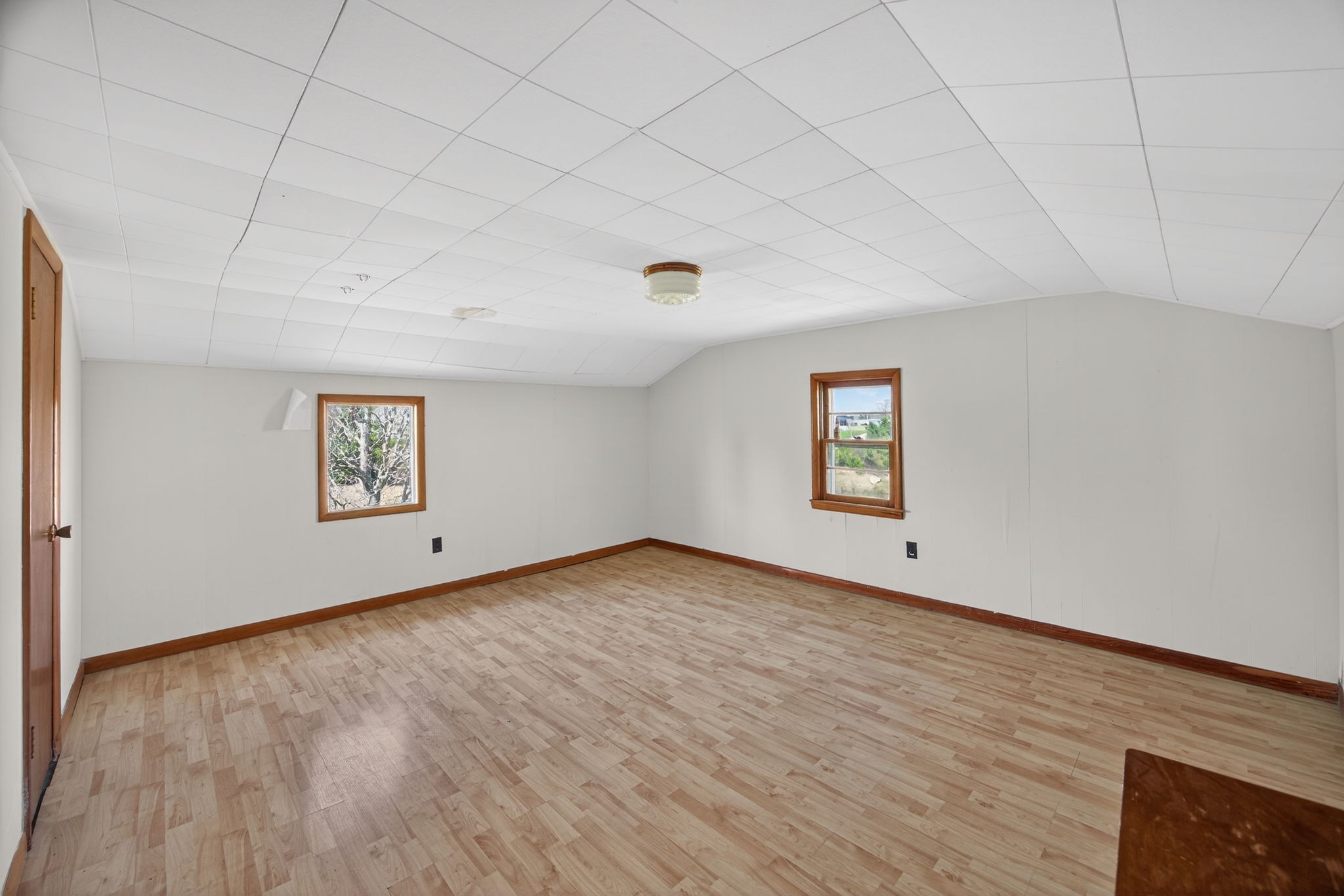 1298 South Bunker Hill Road Sparta, TN 38583 - Photo 19 of 35 a view of an empty room with wooden floor