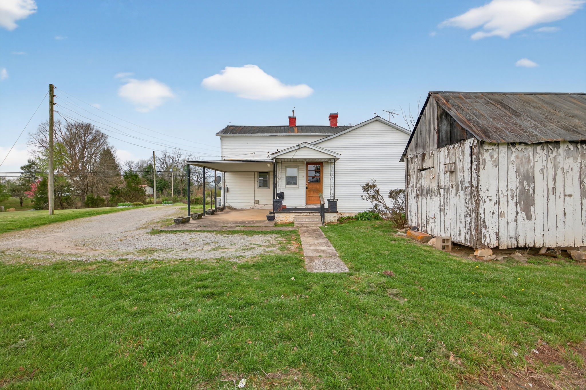 1298 South Bunker Hill Road Sparta, TN 38583 - Photo 20 of 35 a view of a house with backyard and a patio