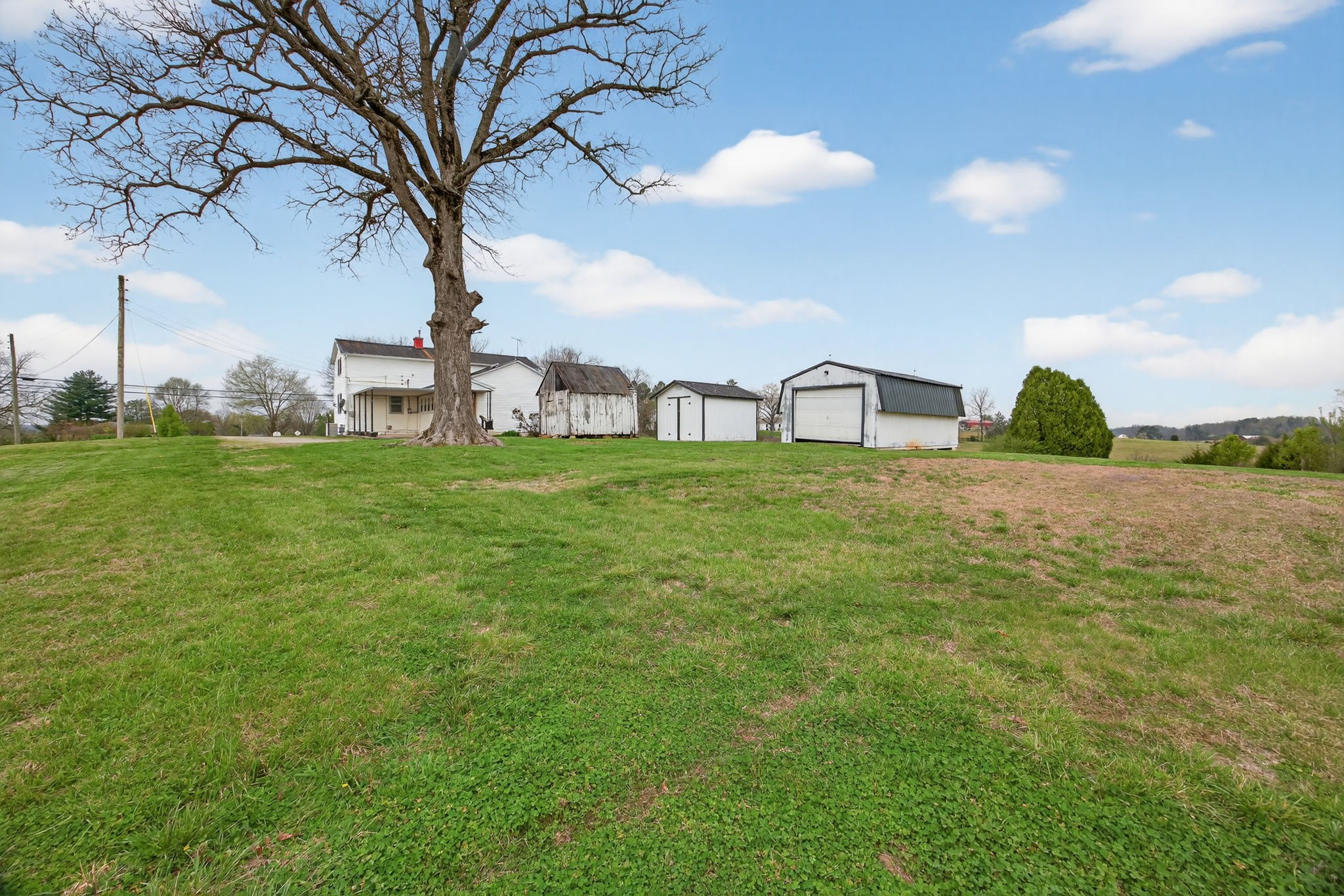 1298 South Bunker Hill Road Sparta, TN 38583 - Photo 21 of 35 a view of a lake with a yard