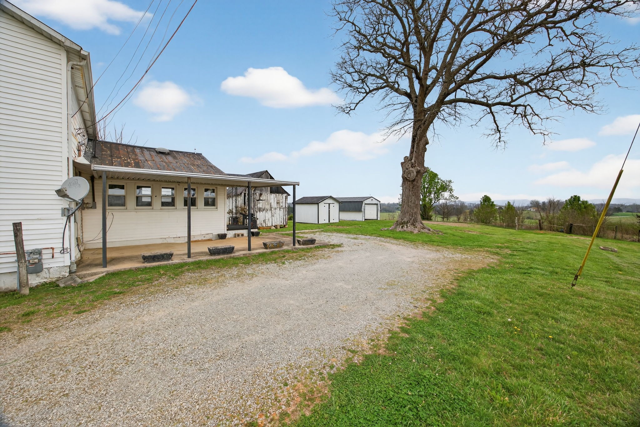 1298 South Bunker Hill Road Sparta, TN 38583 - Photo 23 of 35 a view of a house with a yard