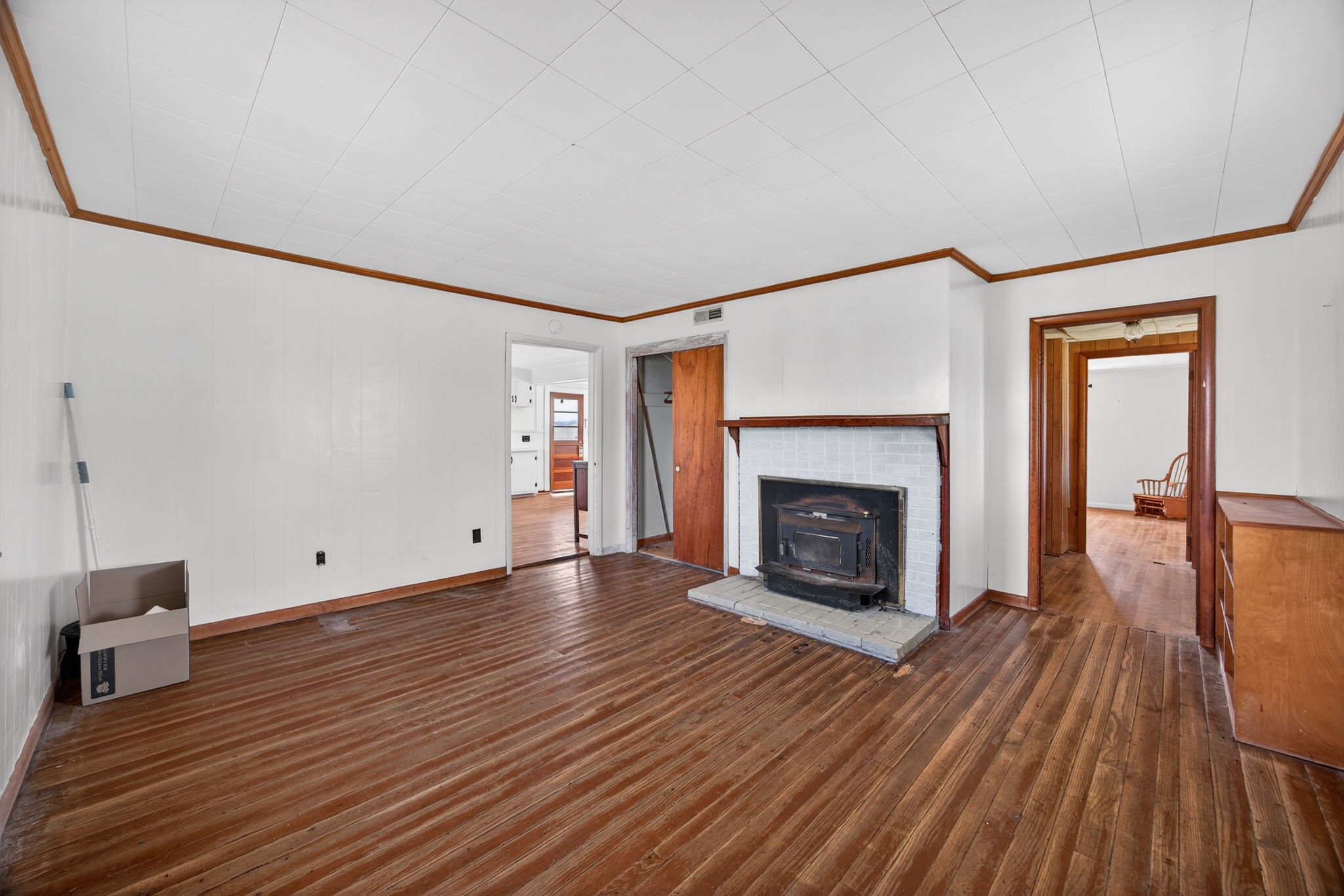 1298 South Bunker Hill Road Sparta, TN 38583 - Photo 9 of 35 a view of a livingroom with wooden floor and a fireplace