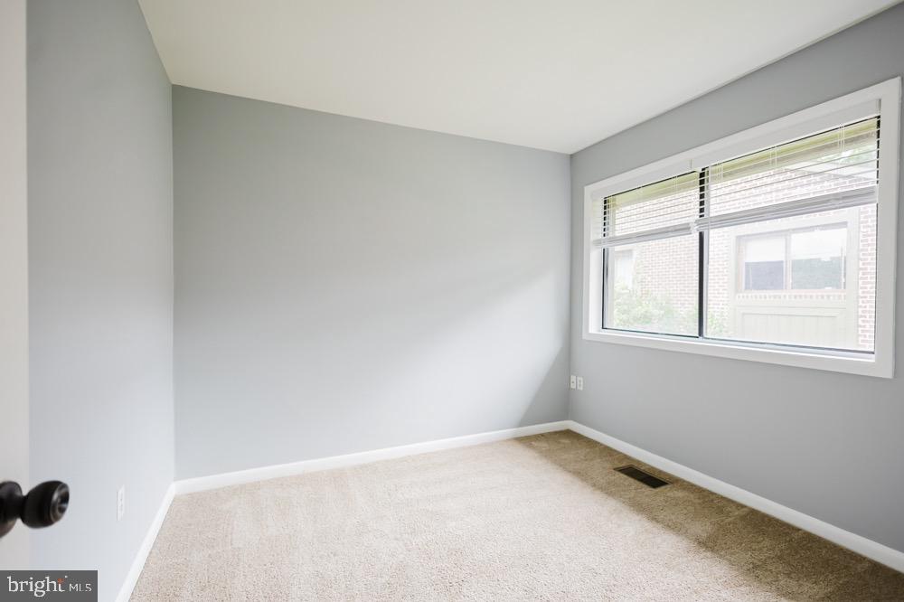 5764 Thunder Hill Road Columbia, MD 21045 - Photo 12 of 16 a view of a room with a window