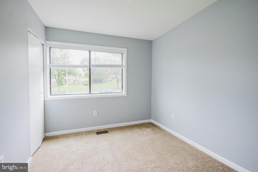 5764 Thunder Hill Road Columbia, MD 21045 - Photo 8 of 16 an empty room with a window