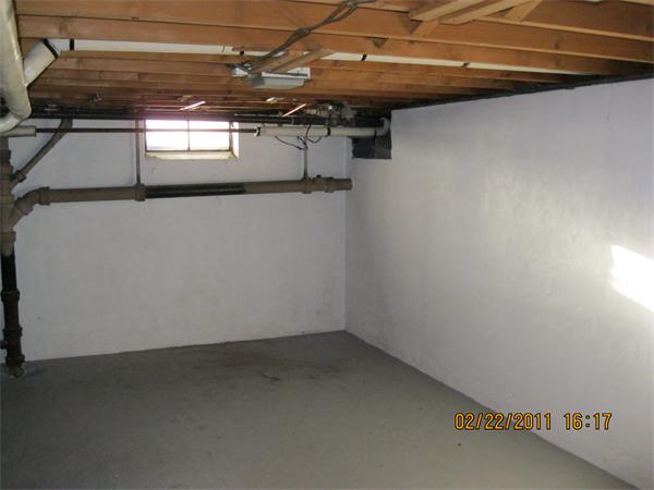 104 Bridle Path Road Springfield, MA 01118 - Photo 29 of 29 a view of a room with racks on the wall
