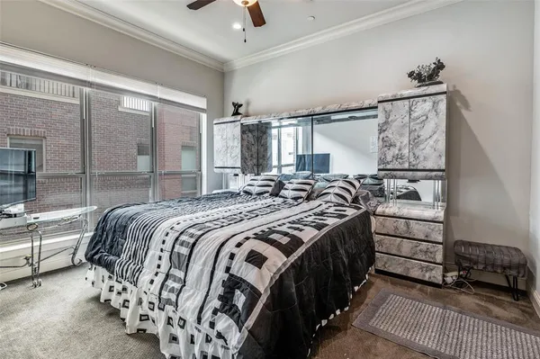 a bedroom with bed and a window