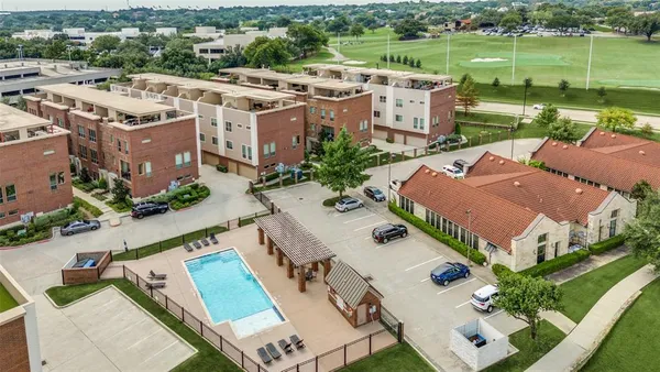 an aerial view of a house with a garden