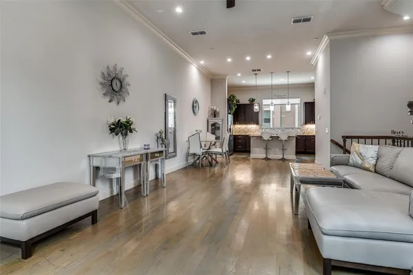 a living room with furniture and a table