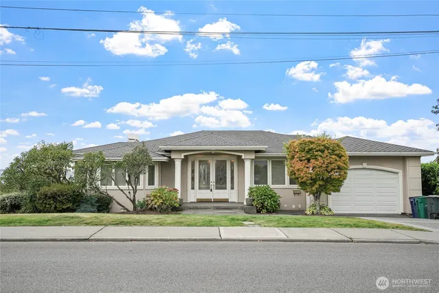 a house view with a garden space