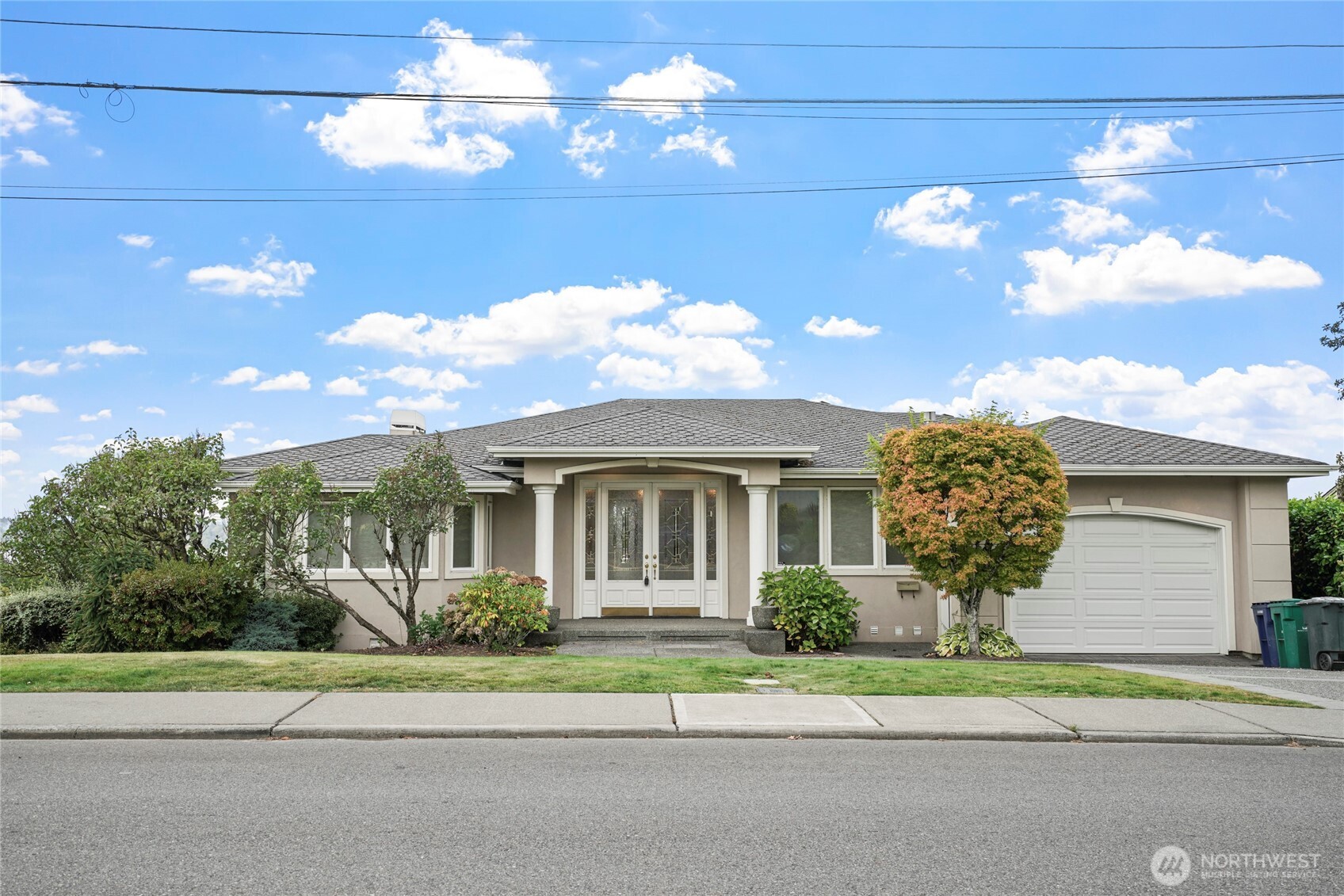 a house view with a garden space