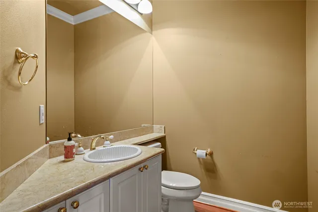 a close view of a bathroom sink and a shower