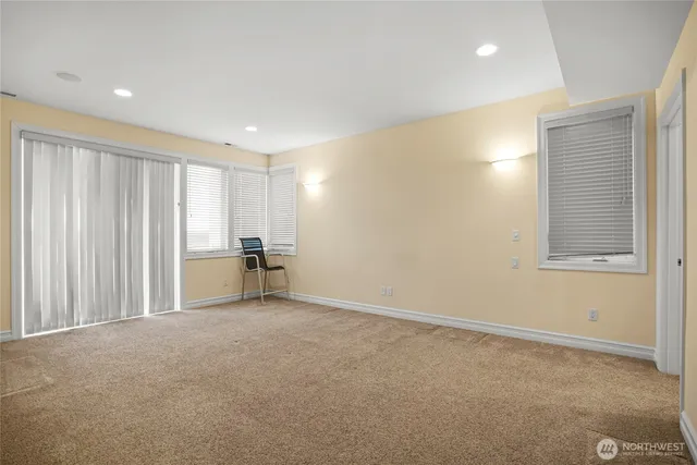 a bathroom with a bathtub and a sink