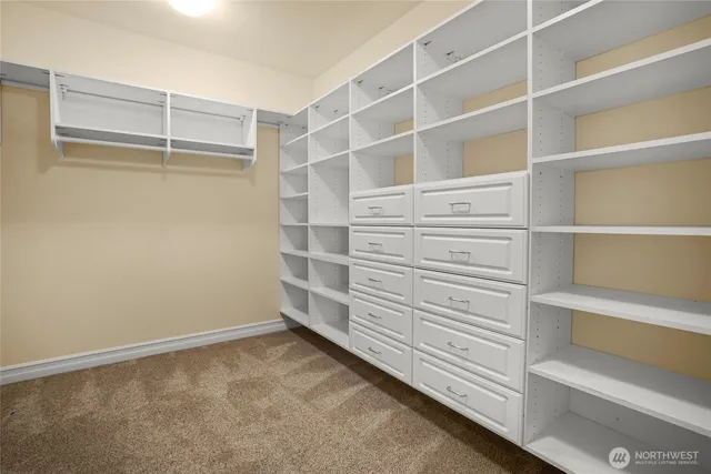 a view of empty room with windows