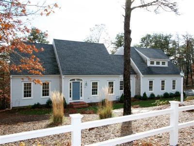 700 Satucket Road Brewster, MA 02631 - Photo 3 of 9 a front view of a house with garden