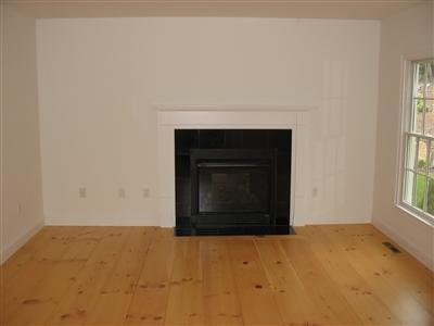 700 Satucket Road Brewster, MA 02631 - Photo 5 of 9 a view of empty room with a fireplace