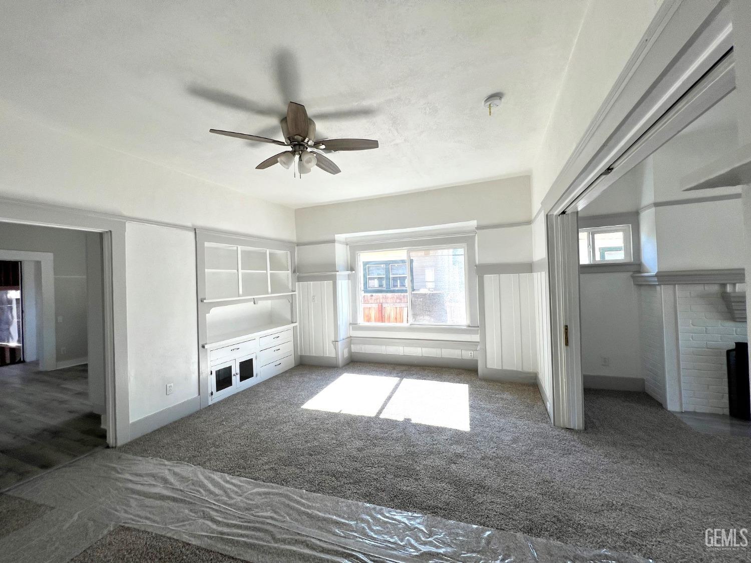 Undisclosed Address Bakersfield, CA 93304 - Photo 15 of 38 a view of livingroom with hardwood floor and window
