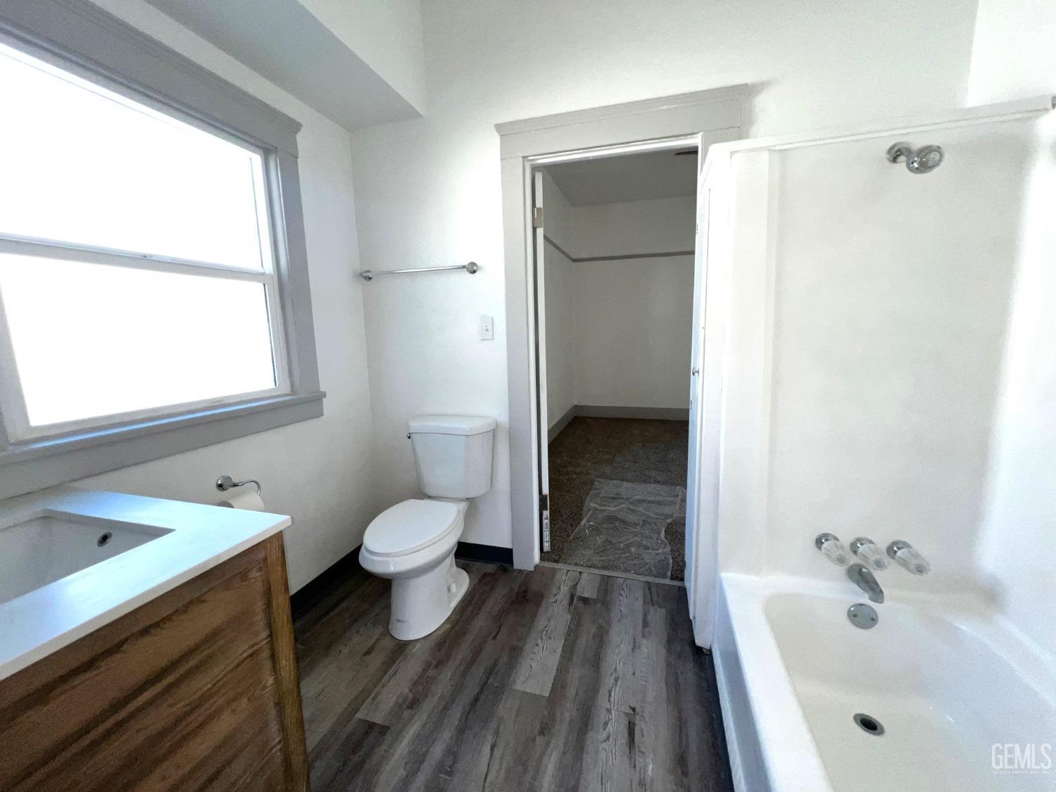 Undisclosed Address Bakersfield, CA 93304 - Photo 22 of 38 a bathroom with a sink toilet and shower
