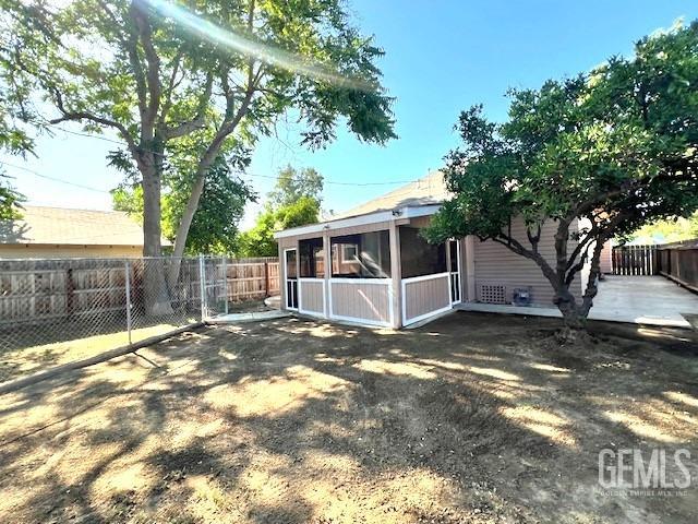 Undisclosed Address Bakersfield, CA 93304 - Photo 31 of 38 a view of a house with a yard