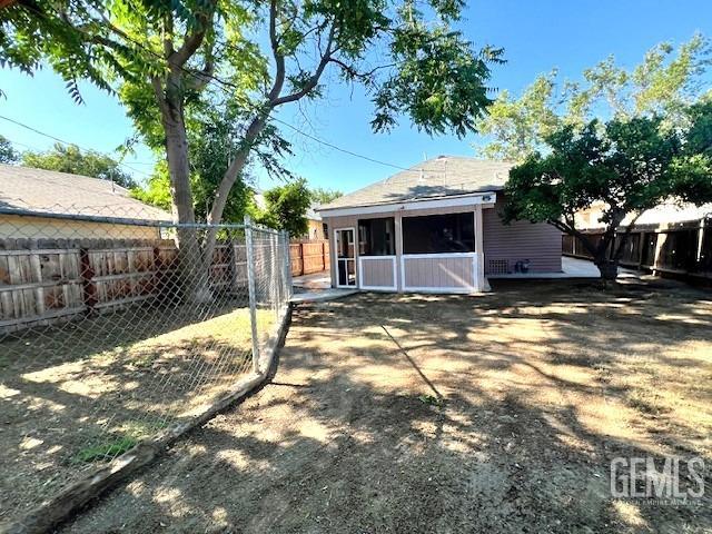 Undisclosed Address Bakersfield, CA 93304 - Photo 35 of 38 a view of a house with a yard