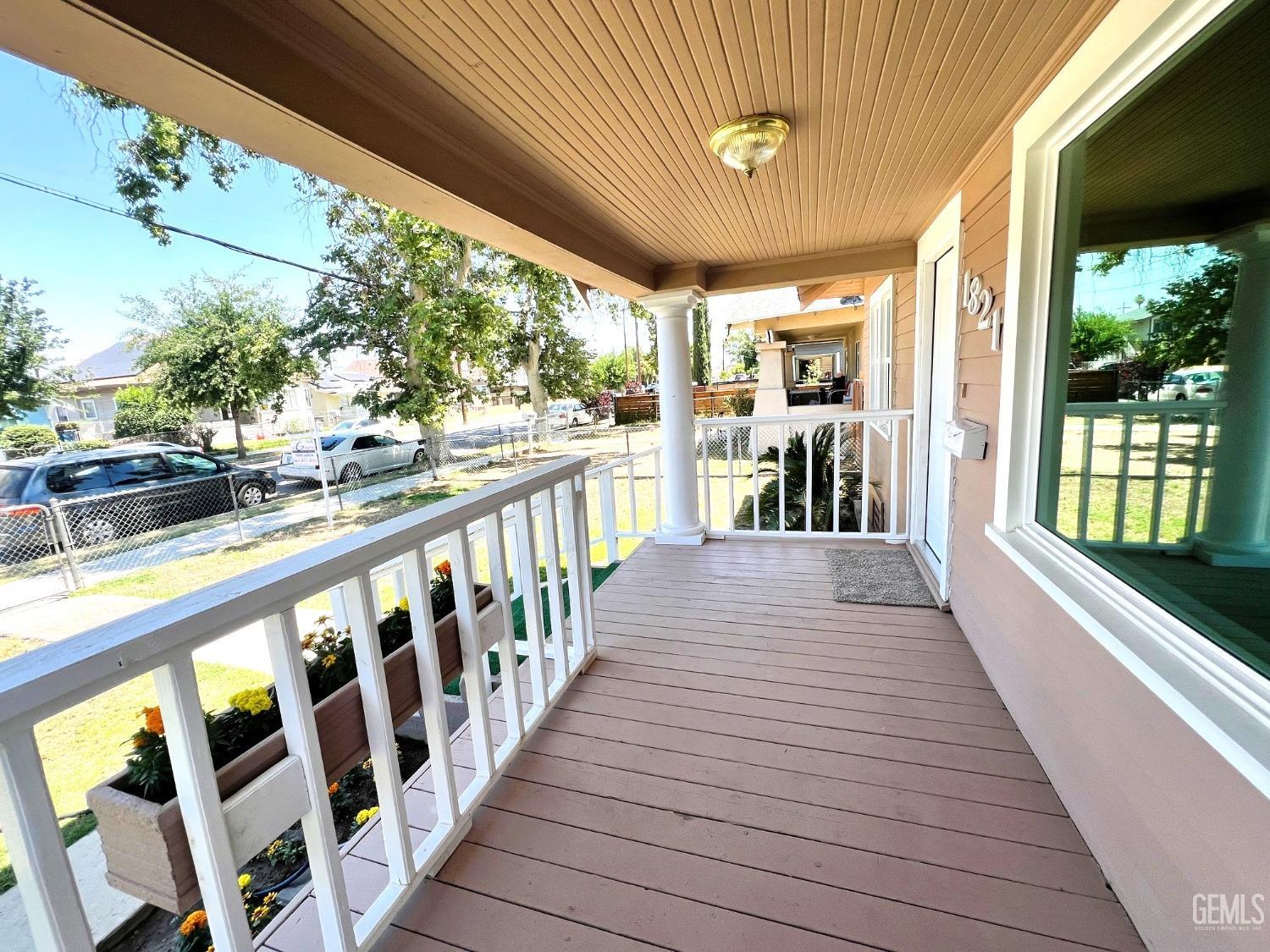 Undisclosed Address Bakersfield, CA 93304 - Photo 5 of 38 a view of a porch with wooden floor