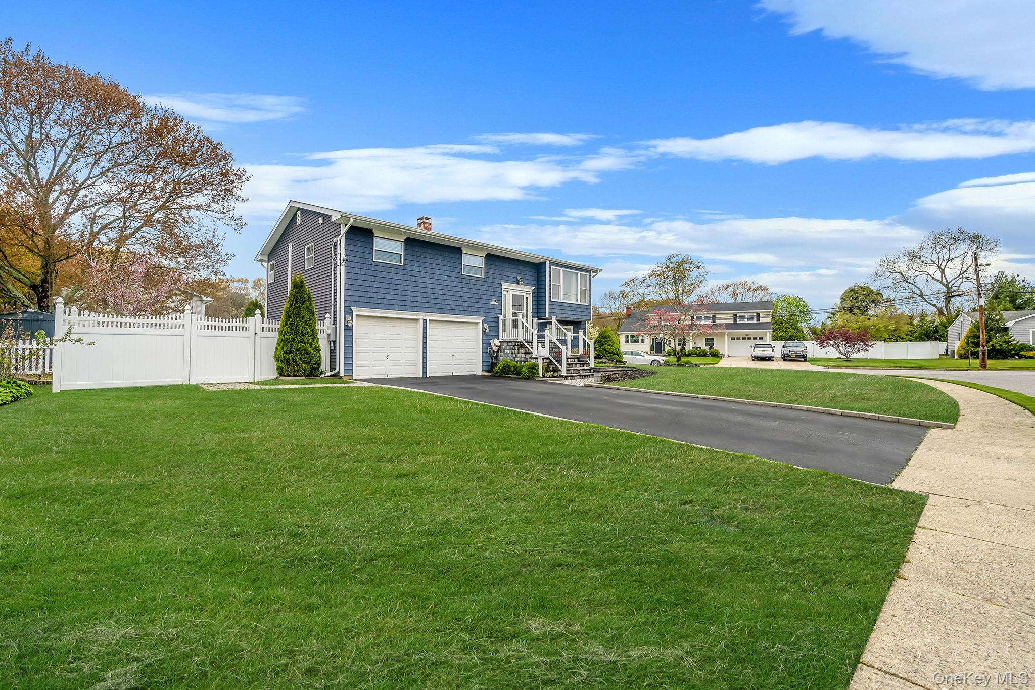 110 Stephen Road Bayport, NY 11705 - Photo 3 of 39 a house view with a garden space