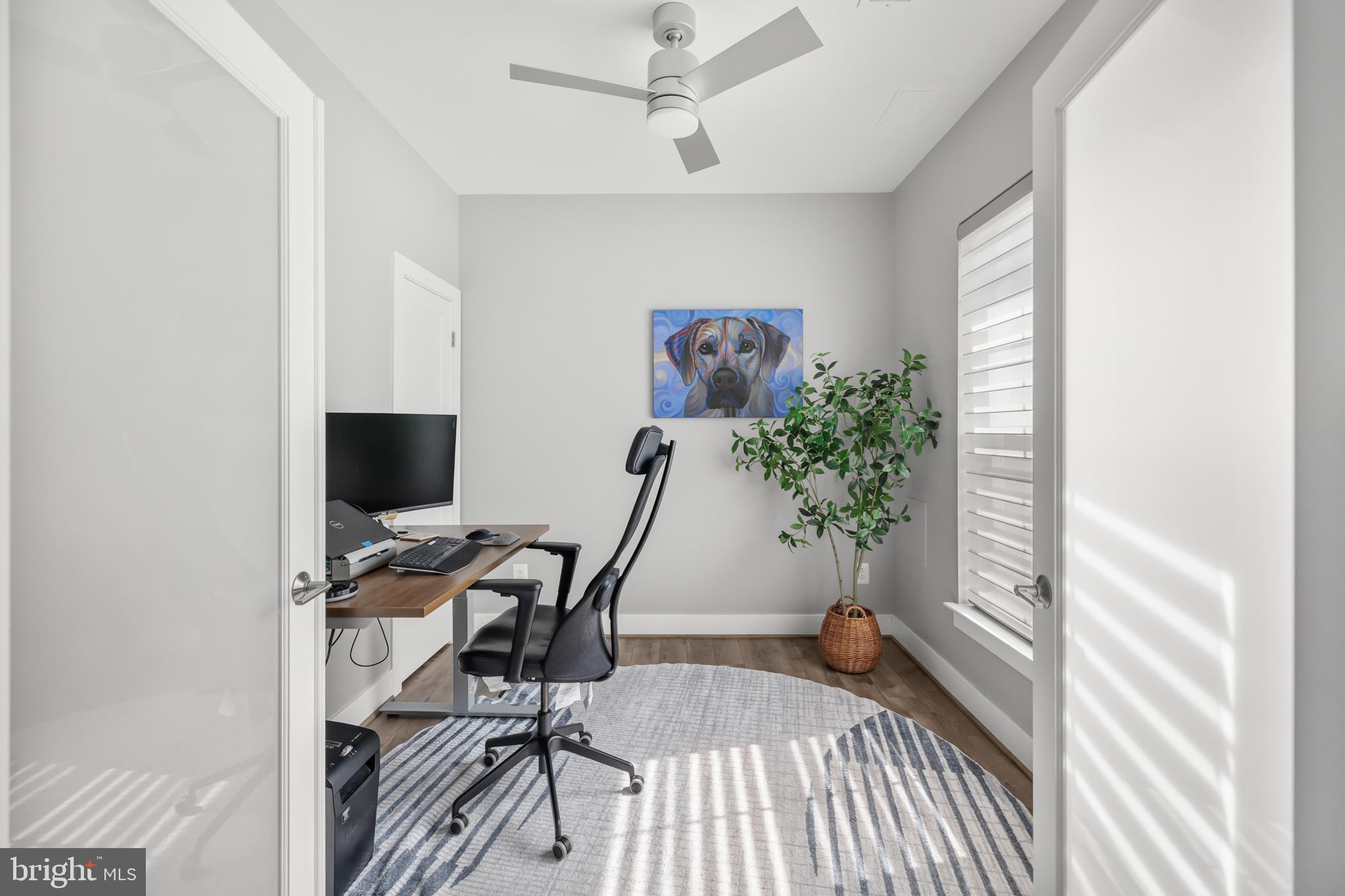 11226 Beaker Street Reston, VA 20190 - Photo 16 of 53 a view of a workspace with furniture and a window