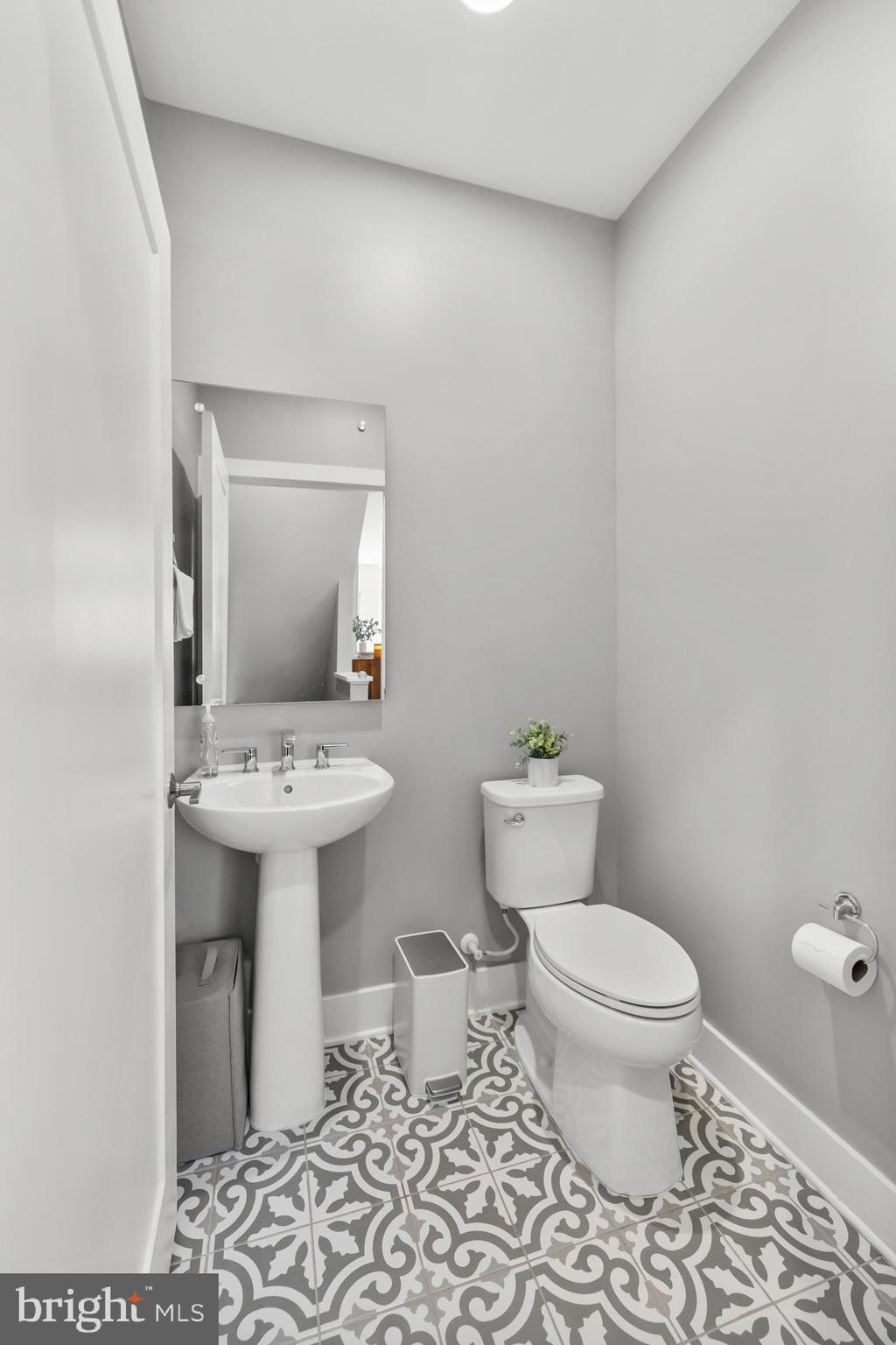 11226 Beaker Street Reston, VA 20190 - Photo 21 of 53 a bathroom with a sink toilet and mirror