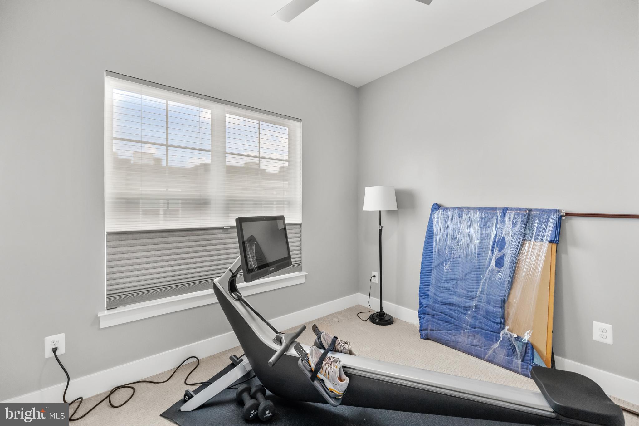 11226 Beaker Street Reston, VA 20190 - Photo 38 of 53 a workspace with furniture and wooden floor