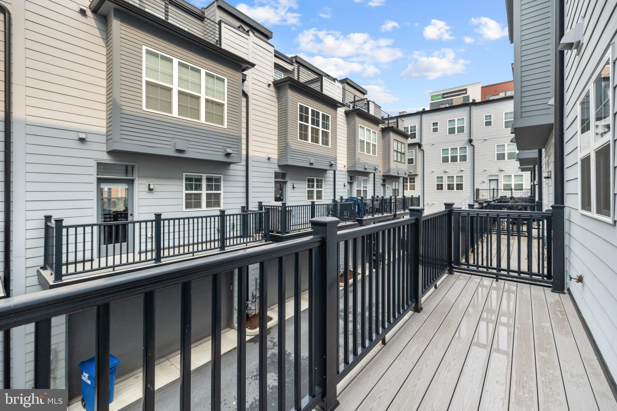 11226 Beaker Street Reston, VA 20190 - Photo 43 of 53 a view of a brick building from a balcony