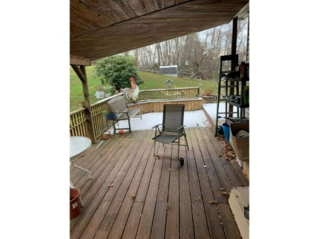 773 McClane Farm Road Washington, PA 15301 - Photo 3 of 12 a view of balcony with wooden floor and outdoor seating