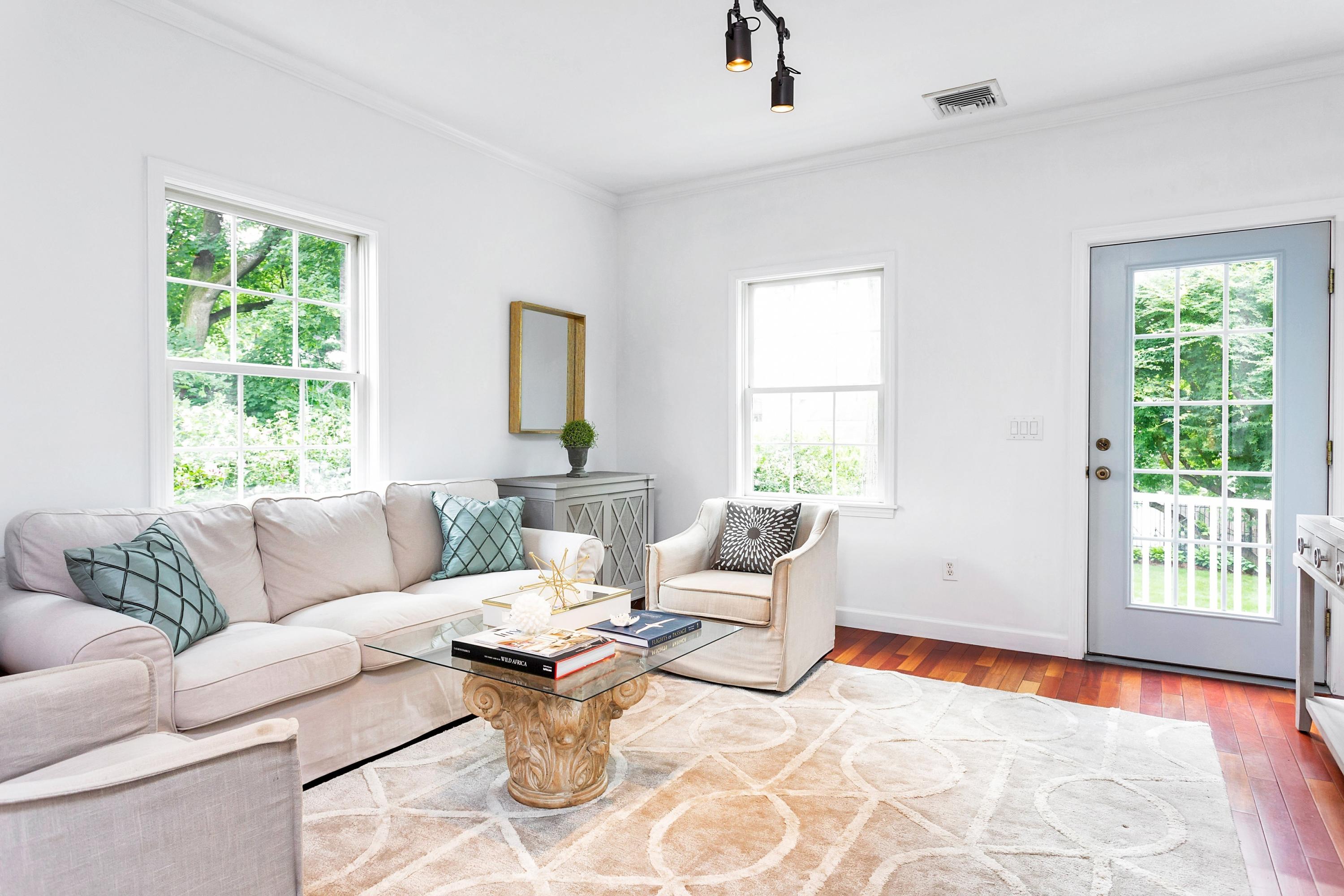28 Dickinson Road Darien, CT 06820 - Photo 11 of 42 a living room with furniture and a window