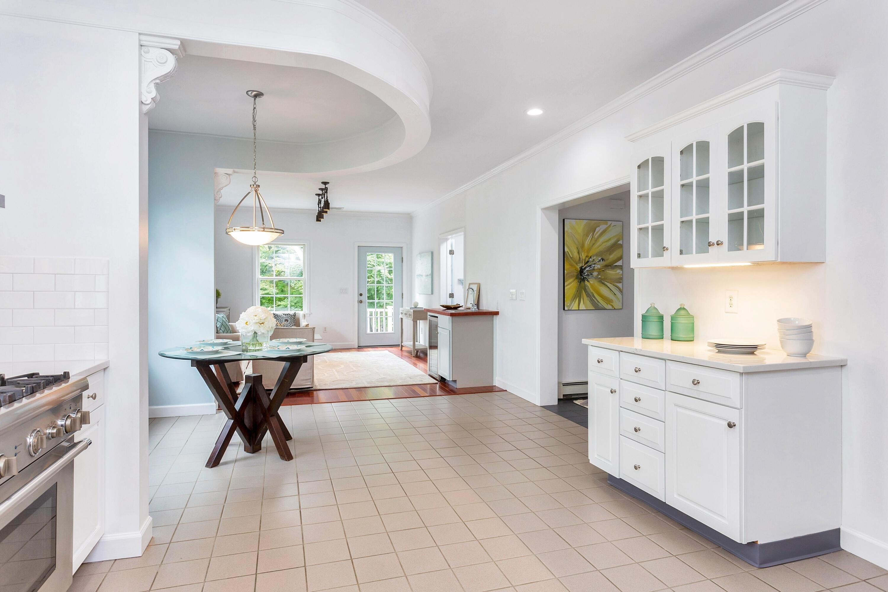 28 Dickinson Road Darien, CT 06820 - Photo 18 of 42 a view of a kitchen and dining area