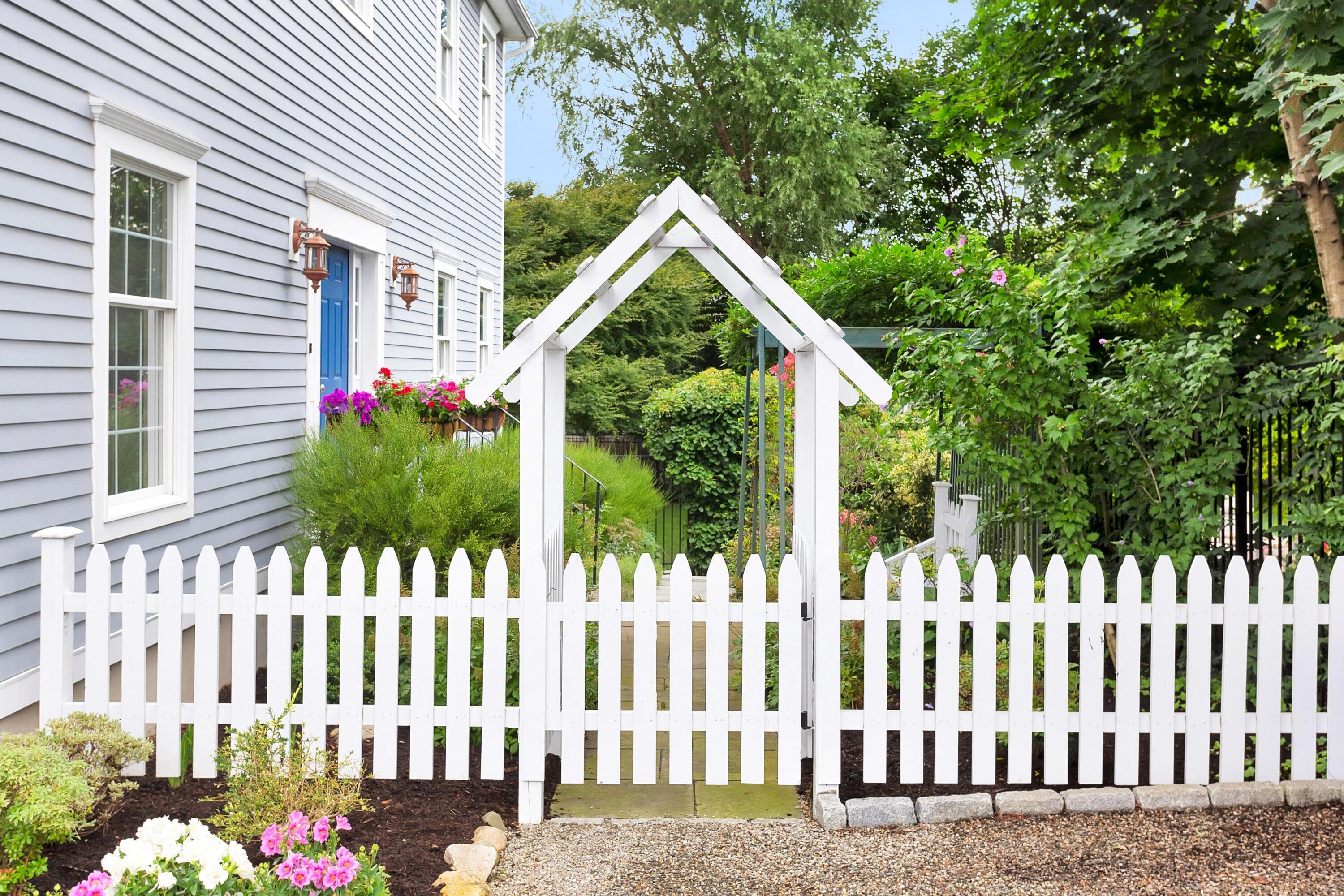 28 Dickinson Road Darien, CT 06820 - Photo 3 of 42 a view of a wooden fence