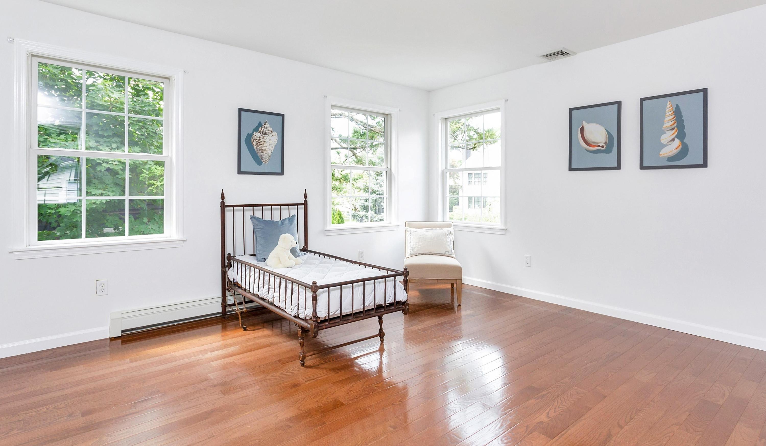 28 Dickinson Road Darien, CT 06820 - Photo 27 of 42 a bedroom with a bed and a window