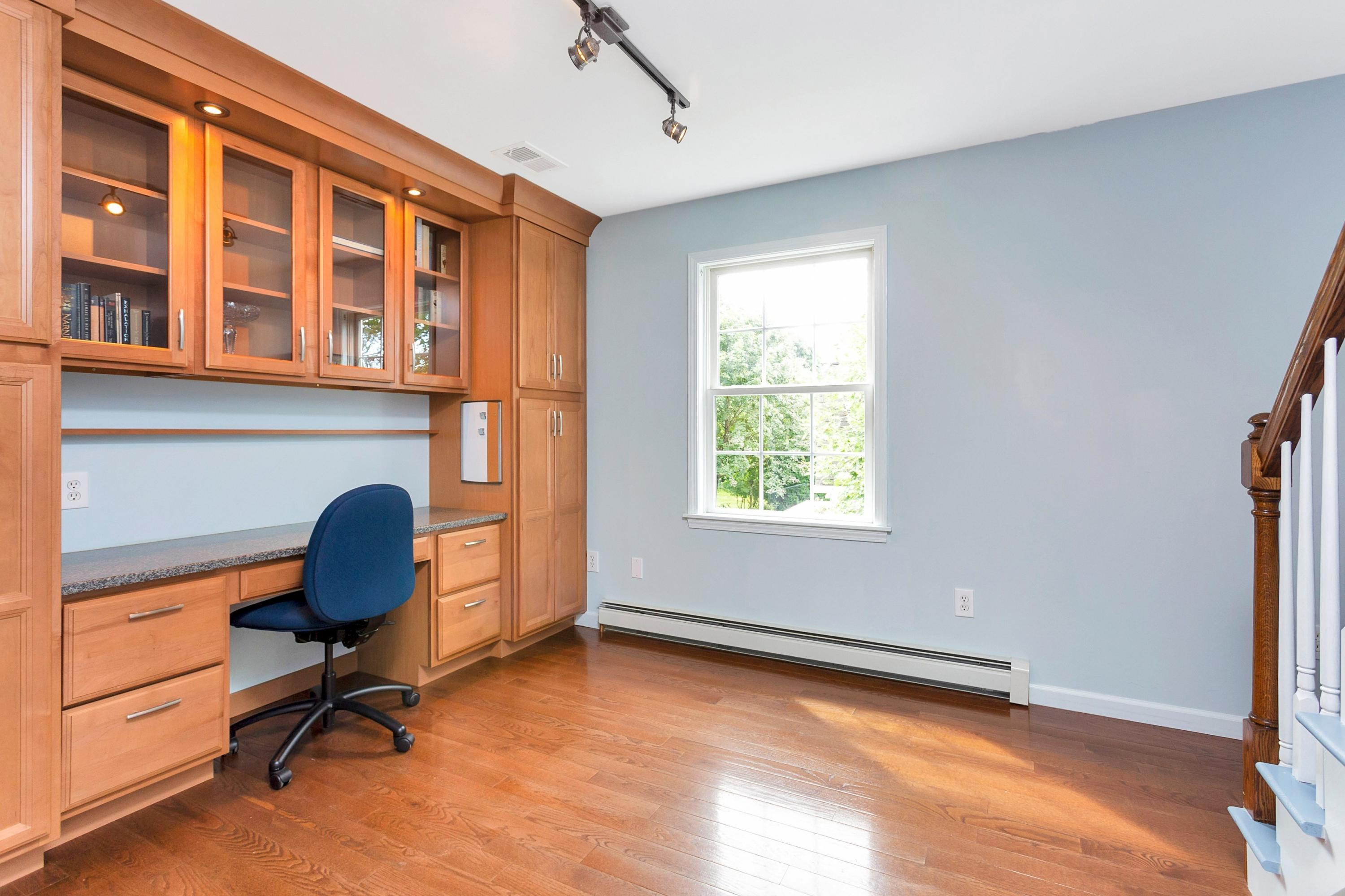 28 Dickinson Road Darien, CT 06820 - Photo 28 of 42 a workspace with furniture and a window