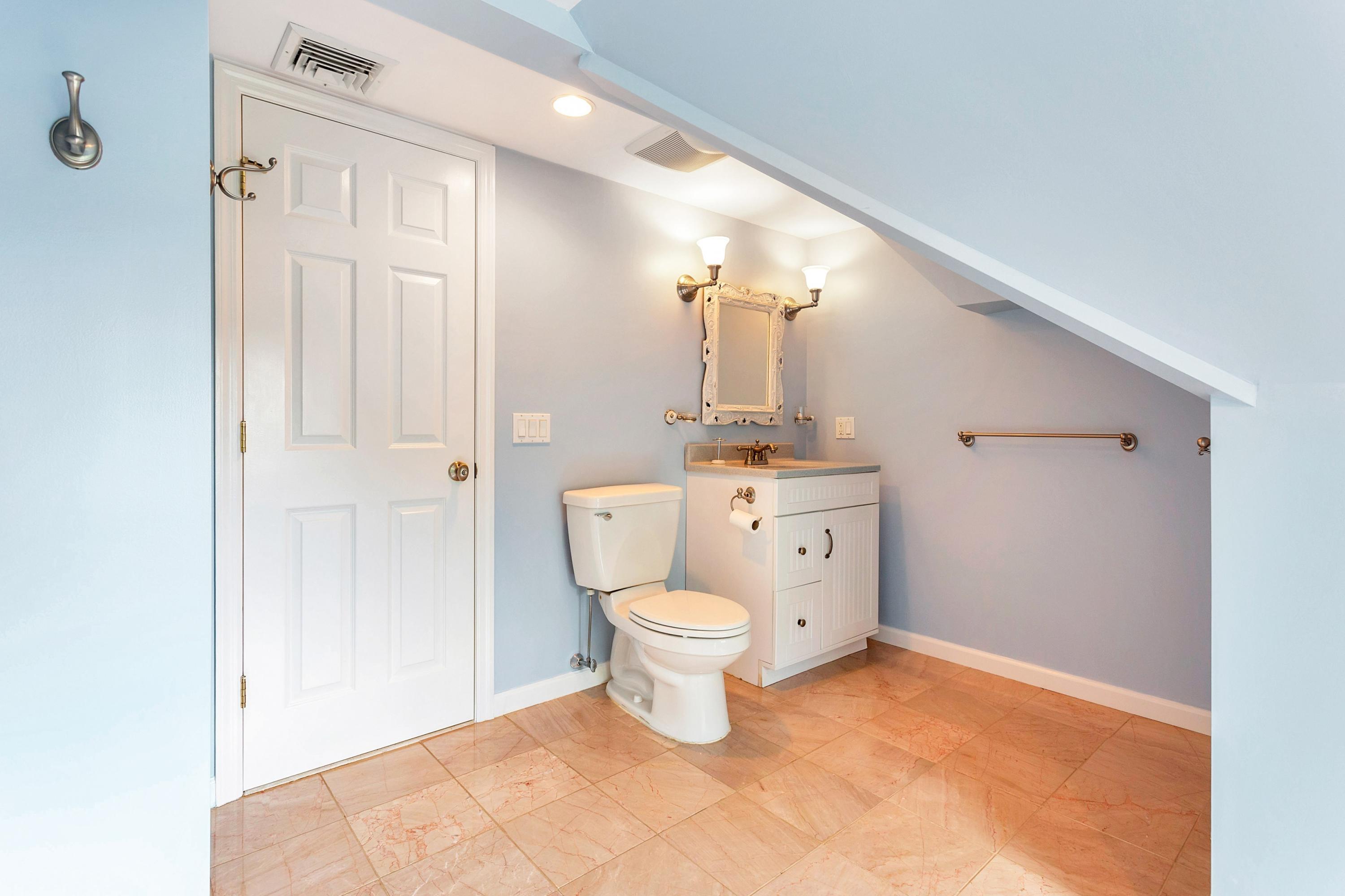 28 Dickinson Road Darien, CT 06820 - Photo 30 of 42 a bathroom with a sink toilet and a shower