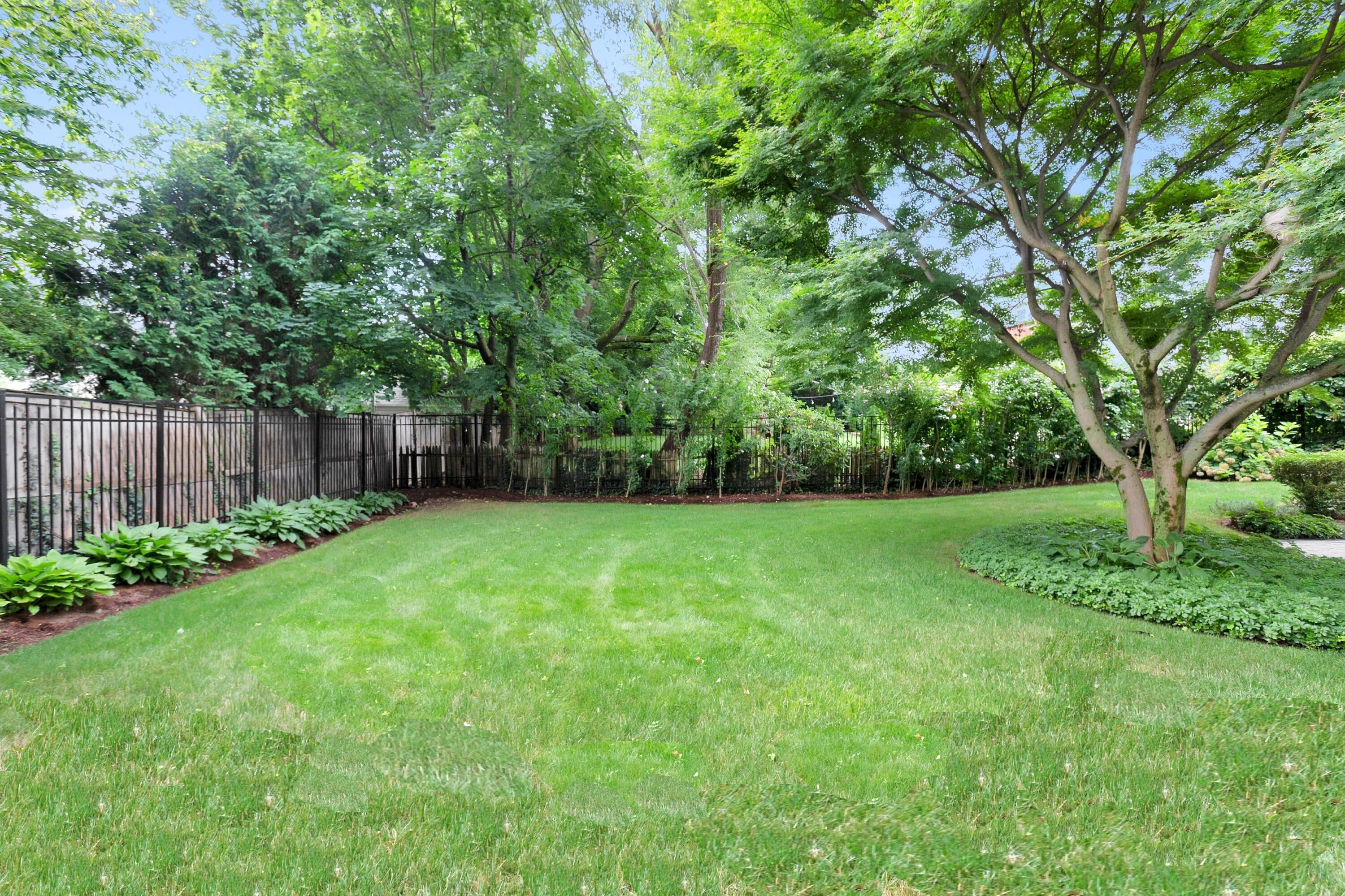 28 Dickinson Road Darien, CT 06820 - Photo 37 of 42 a view of a yard with a tree