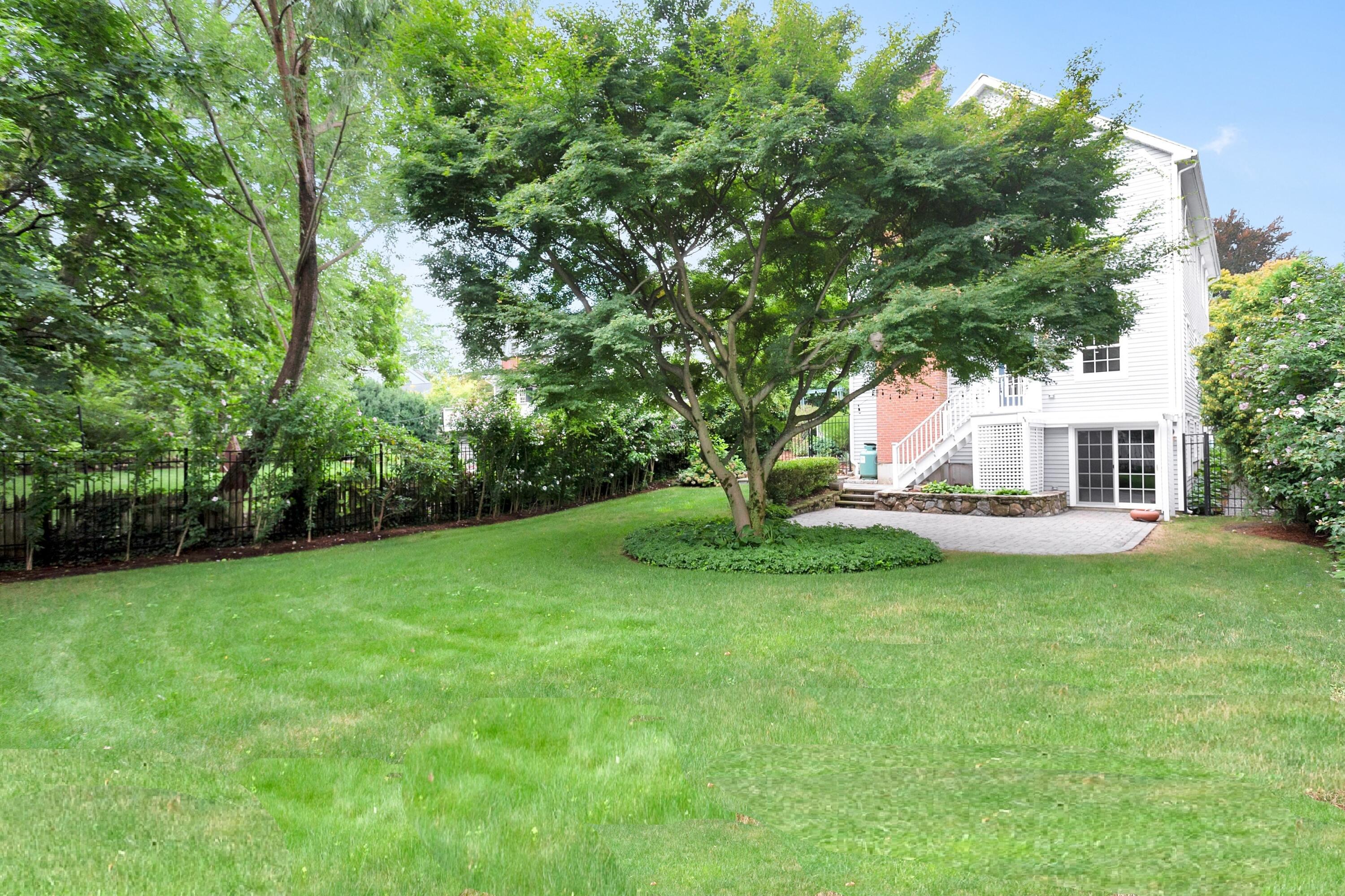 28 Dickinson Road Darien, CT 06820 - Photo 38 of 42 a view of a house with backyard and garden