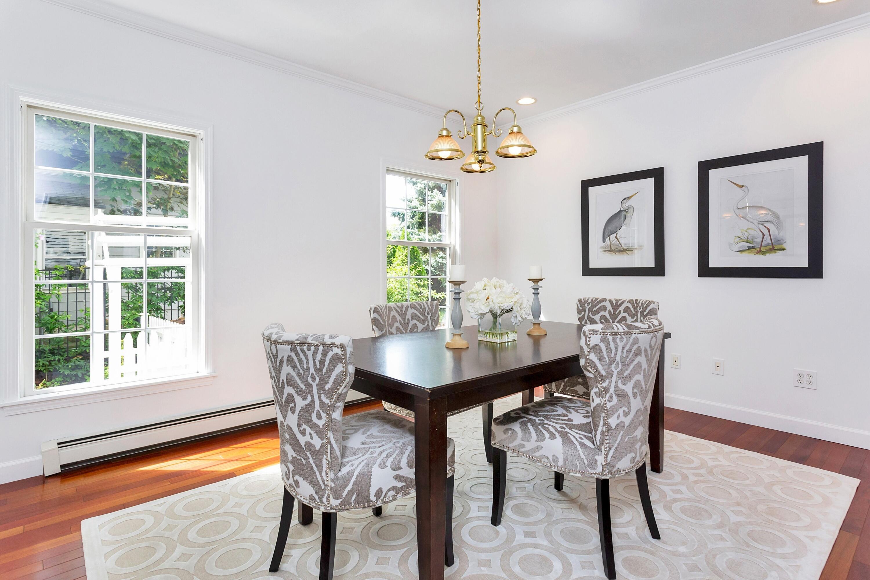 28 Dickinson Road Darien, CT 06820 - Photo 8 of 42 a view of a dining room with furniture window and wooden floor