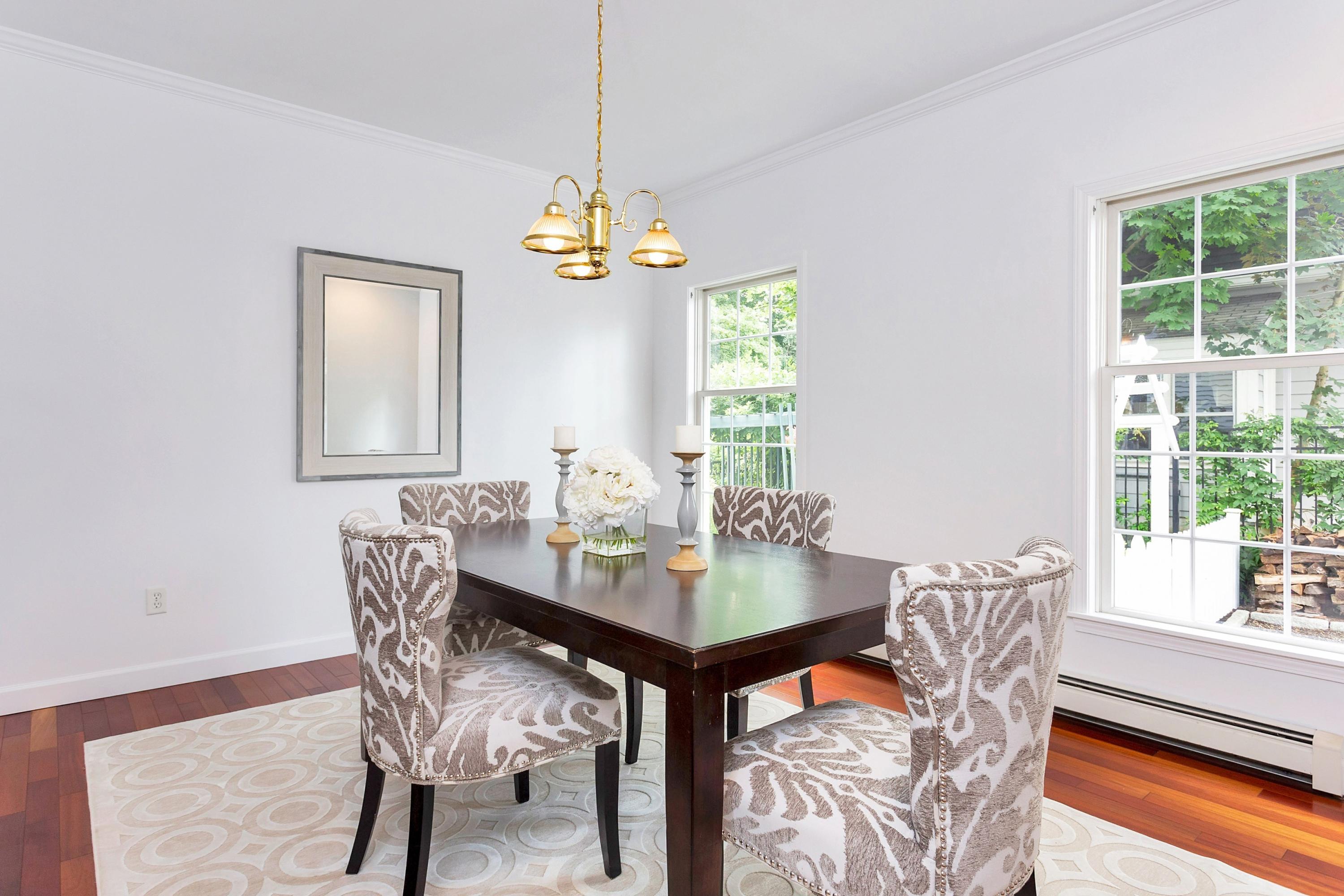 28 Dickinson Road Darien, CT 06820 - Photo 9 of 42 a view of a dining room with furniture window and outside view