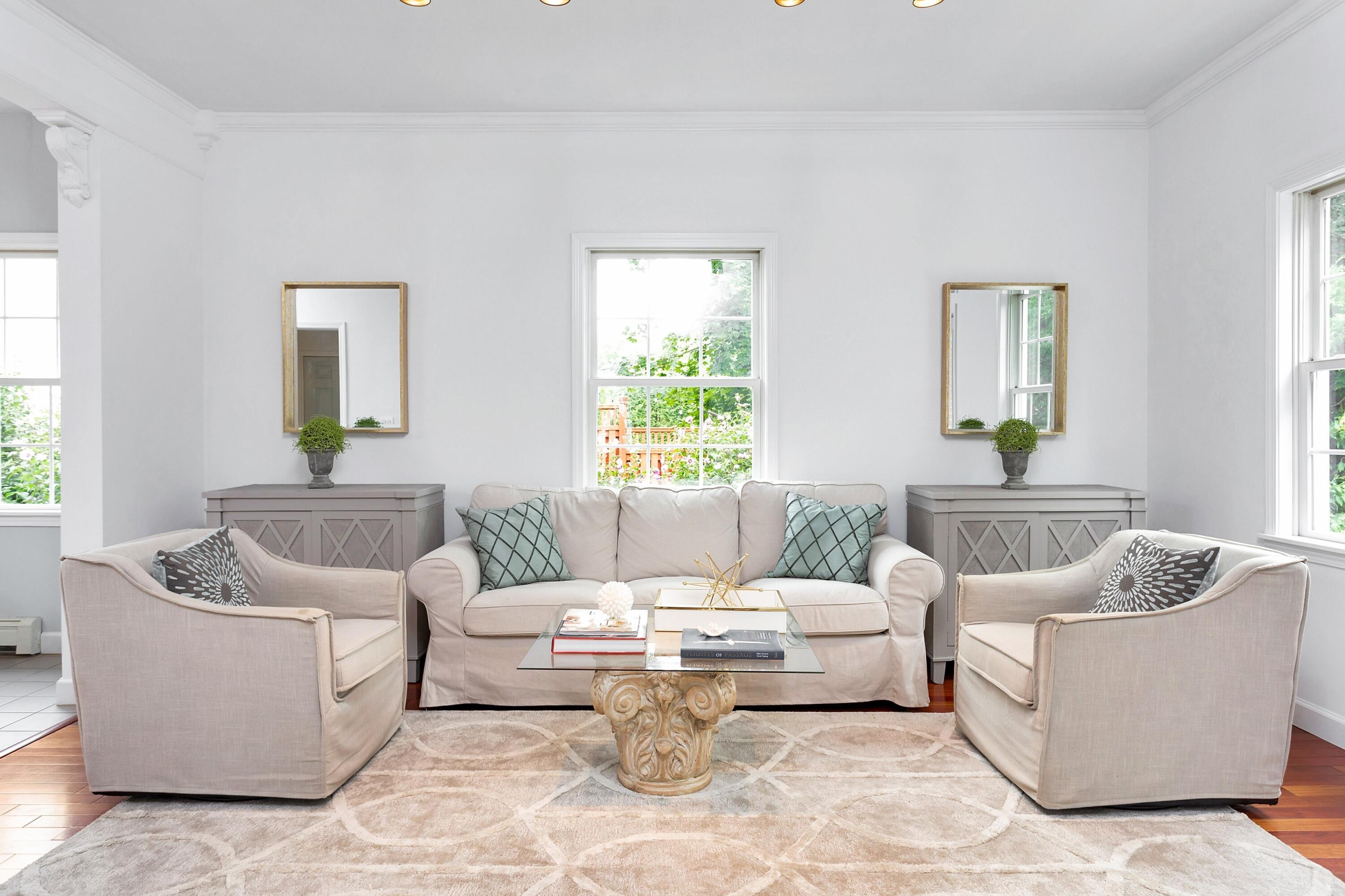 28 Dickinson Road Darien, CT 06820 - Photo 10 of 42 a living room with furniture and a window
