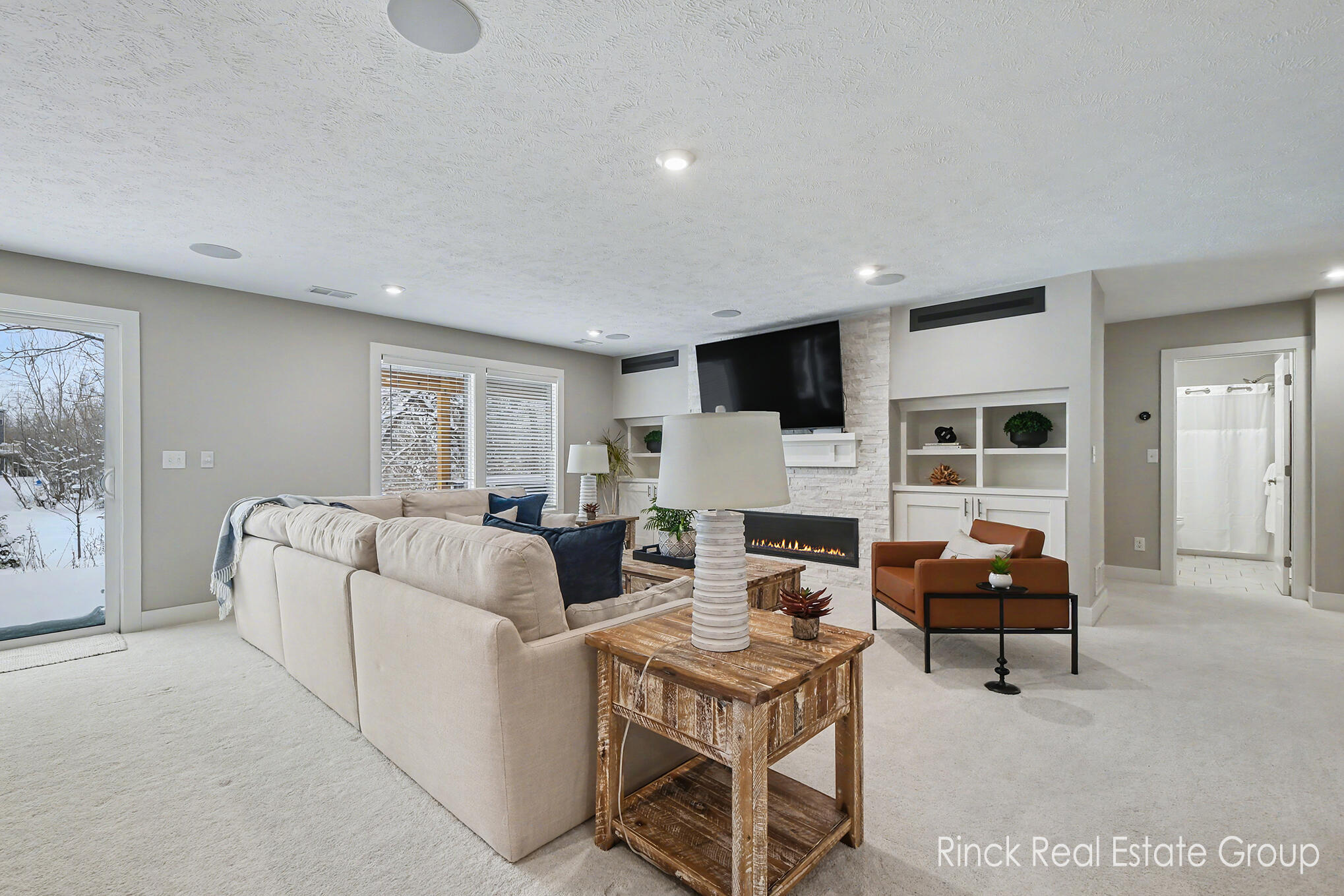 3076 Brayridge Drive Jenison, MI 49428 - Photo 45 of 60 lower level with fireplace zoned heat