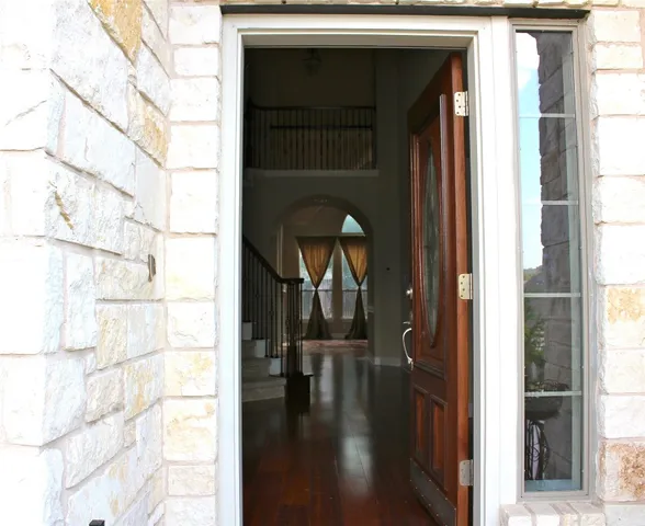 a picture of a bathroom with a shower